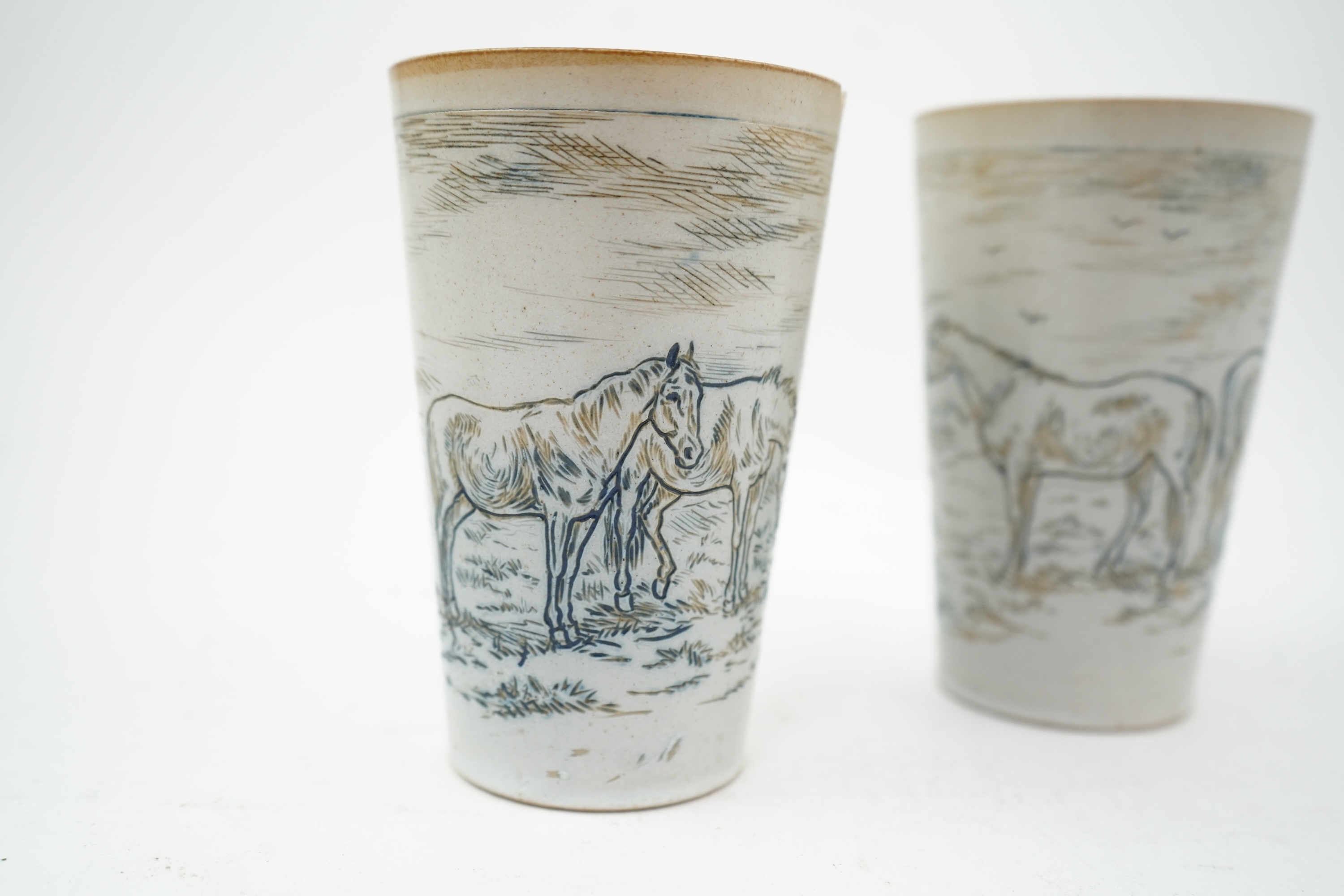 Hannah Barlow for Doulton Lambeth: A Stoneware Lemonade jug and two beakers